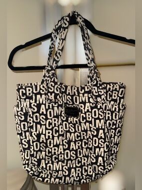 Gently used,Marc Jacobs Pretty Nylon Tate Tote,black&white all-over logo print.